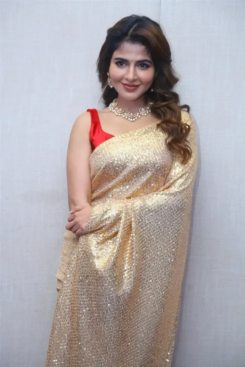 Iswarya Menon in Gold color Saree at Spy Movie Release Event